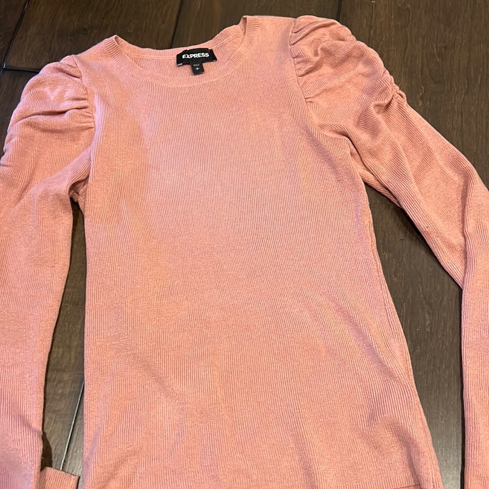 Express fitted sweater with gathered shoulders.